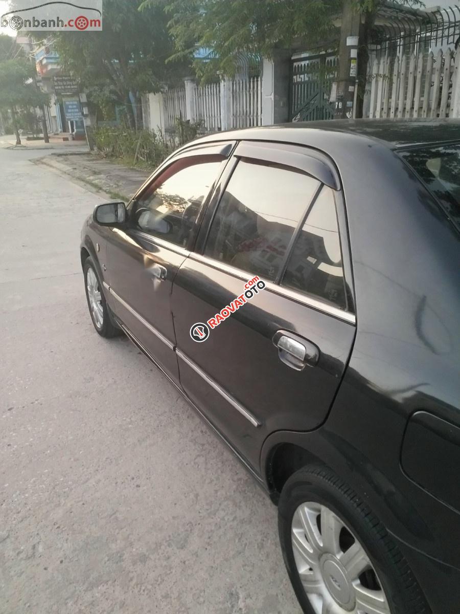 Bán ô tô Ford Laser 1.8AT đời 2003, màu đen -1