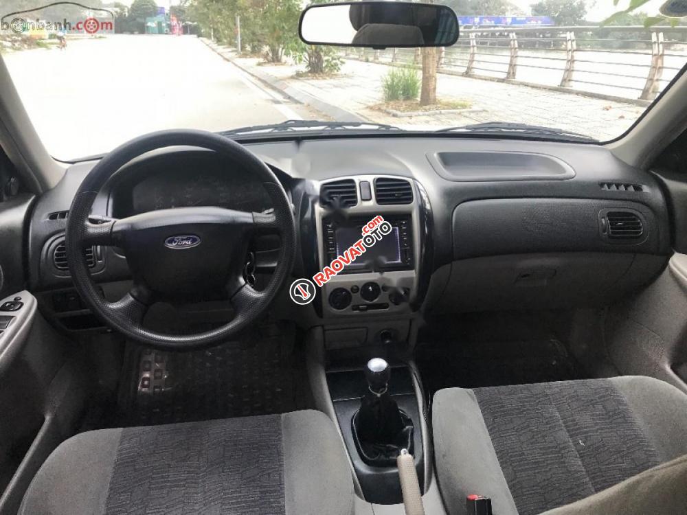 Bán Ford Laser 1.8 MT đời 2003, màu trắng, xe nhập-0