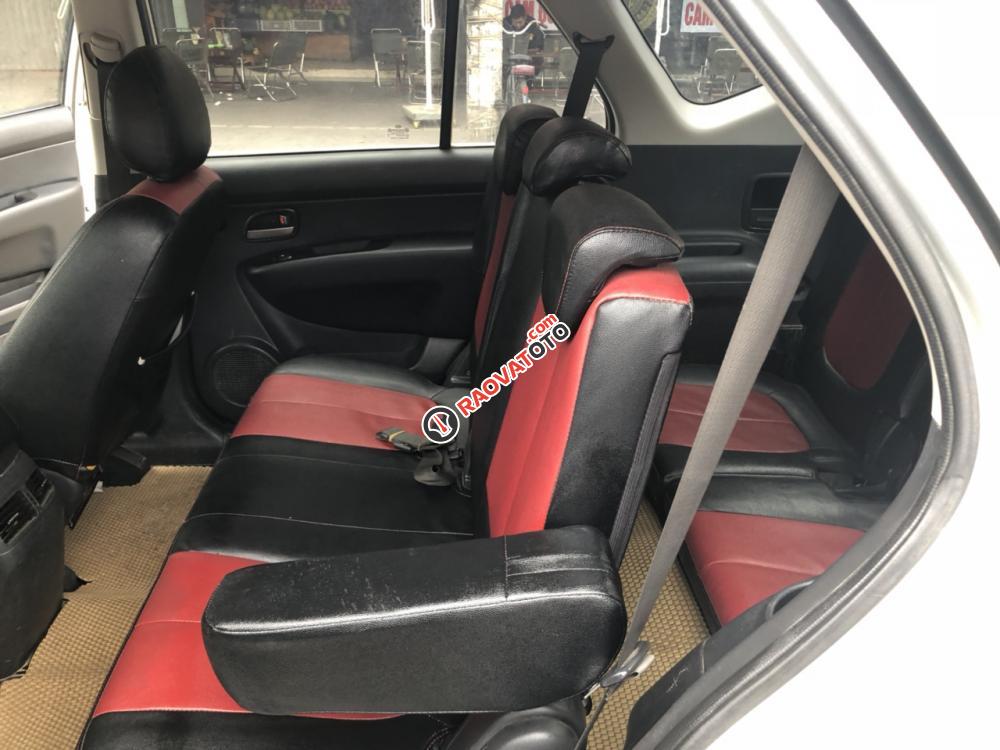 Nhà cần bán Kia Caren 2011, màu bạc-0