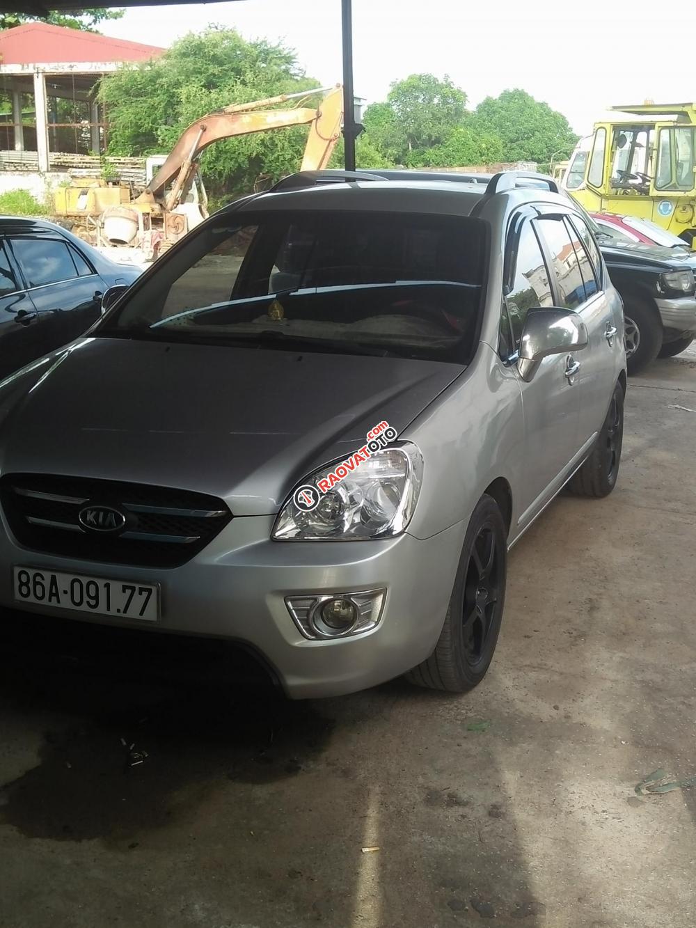 Bán xe Kia Carens LX đời 2010, màu bạc-2