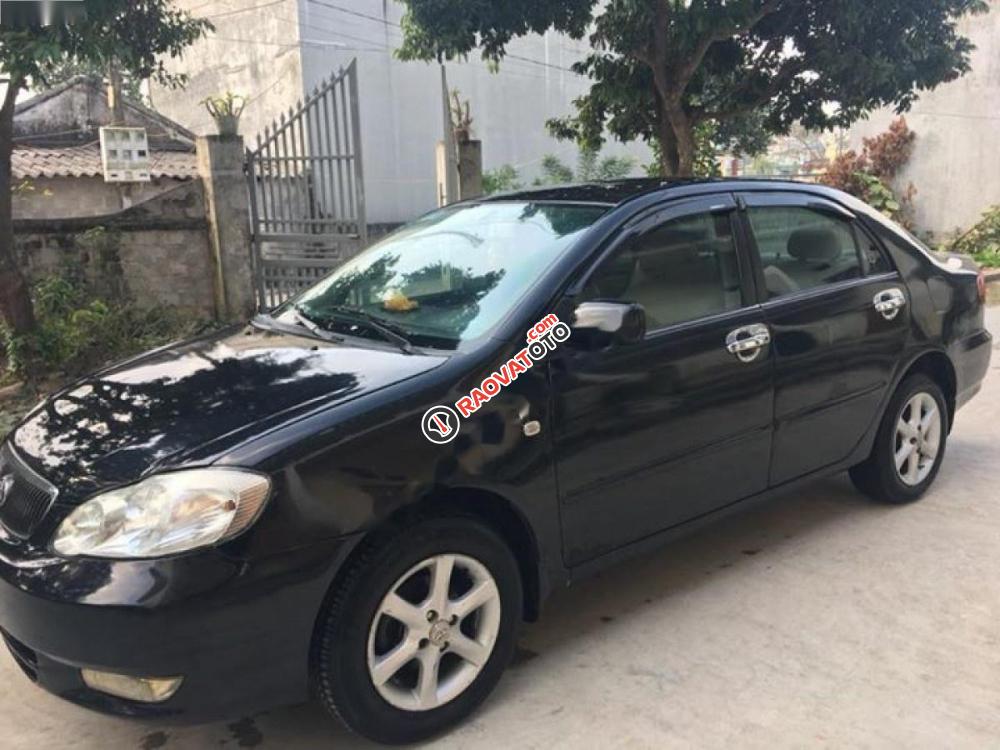 Cần bán lại xe Toyota Corolla altis 1.8MT đời 2003, màu đen số sàn-2