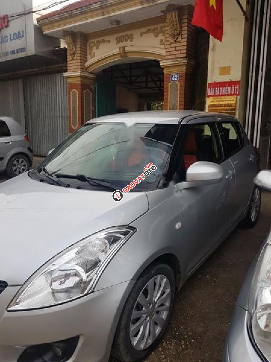 Cần bán lại xe Suzuki Swift 1.4 AT sản xuất 2013, màu bạc, nhập khẩu nguyên chiếc-1