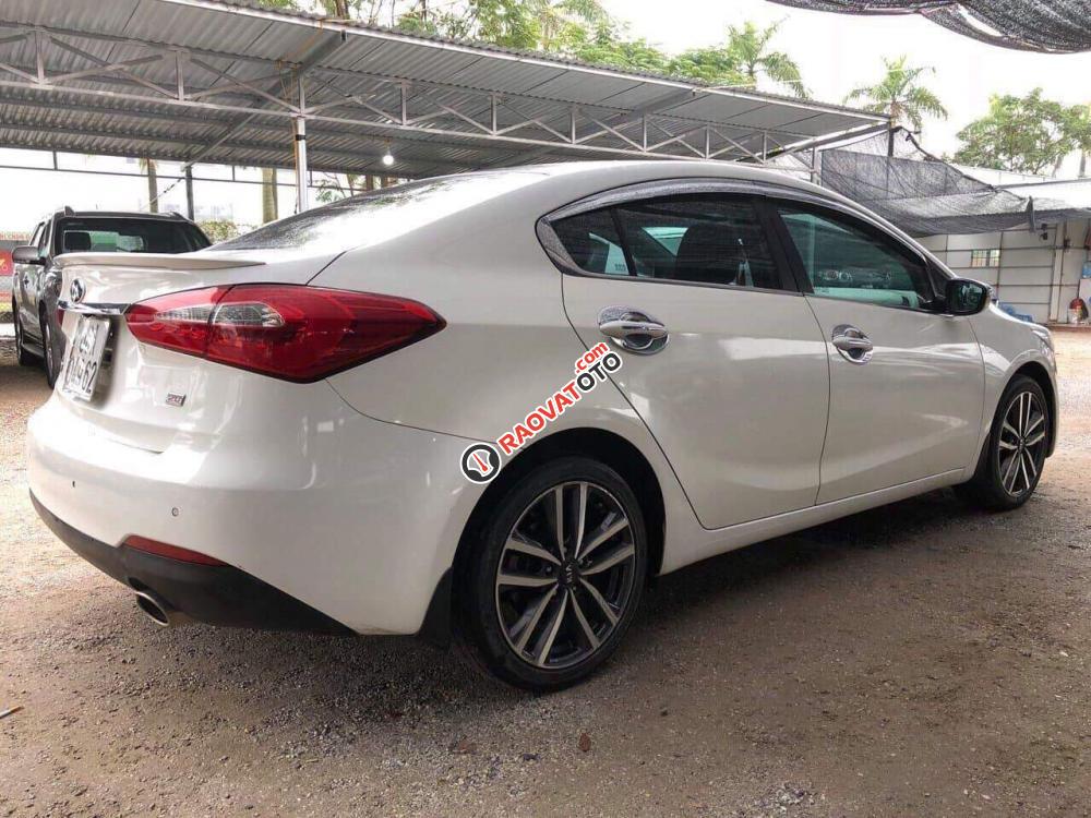 Cần bán lại xe Kia K3 AT đăng ký lần đầu 2016, màu trắng ít sử dụng, 595 triệu-0