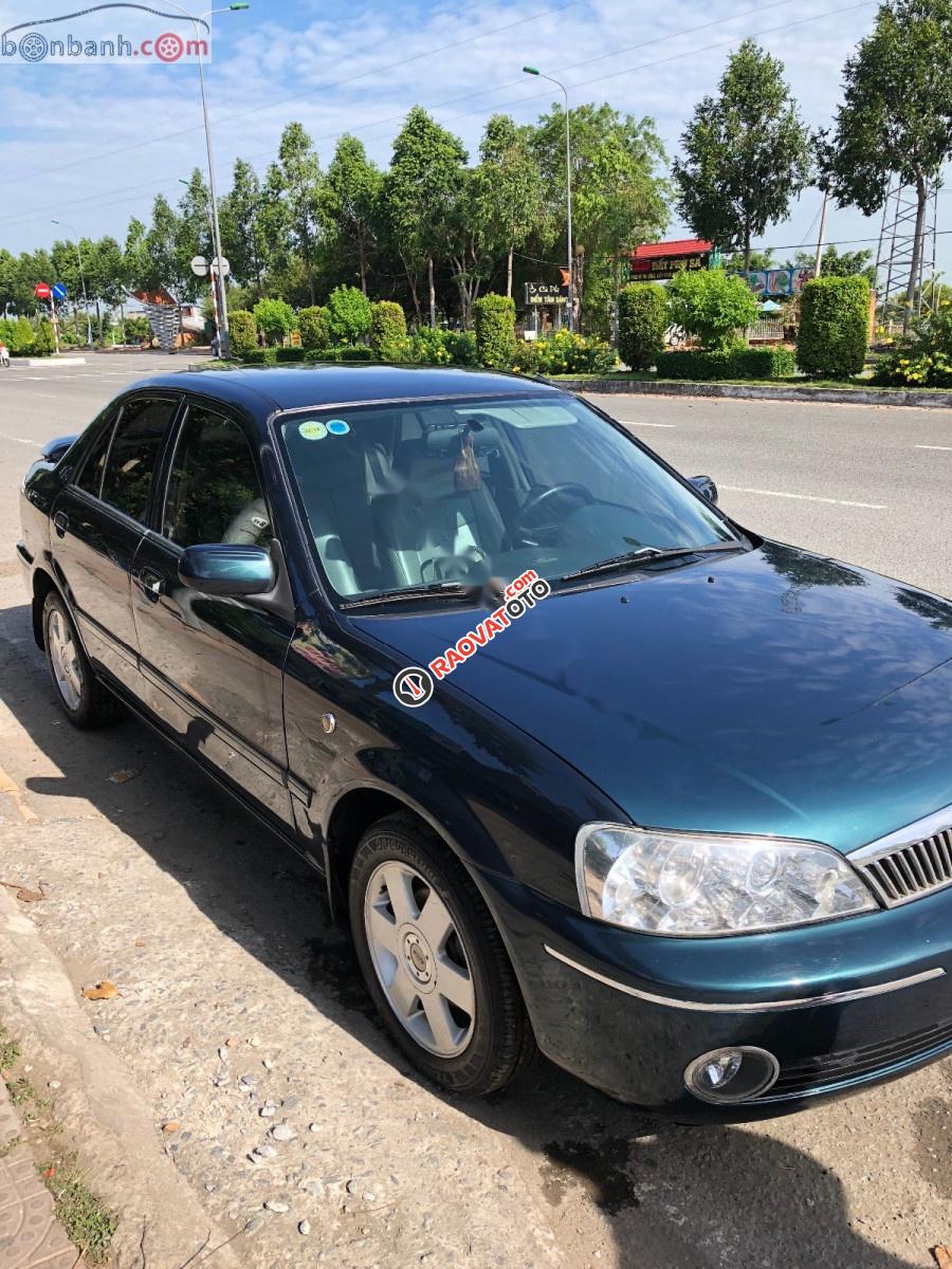 Bán ô tô Ford Laser 1.8 2002, màu xanh lam số sàn, giá 185tr-2