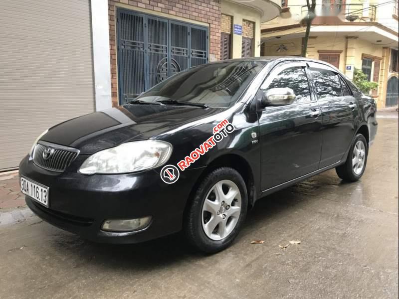 Cần bán gấp Toyota Corolla altis 1.8MT đời 2009, màu đen, xe gia đình -0