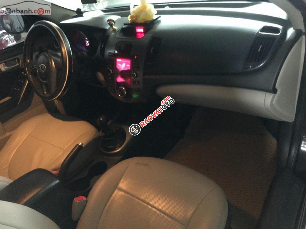 Bán Kia Cerato 1.6 MT đời 2010, màu đen, xe nhập  -1