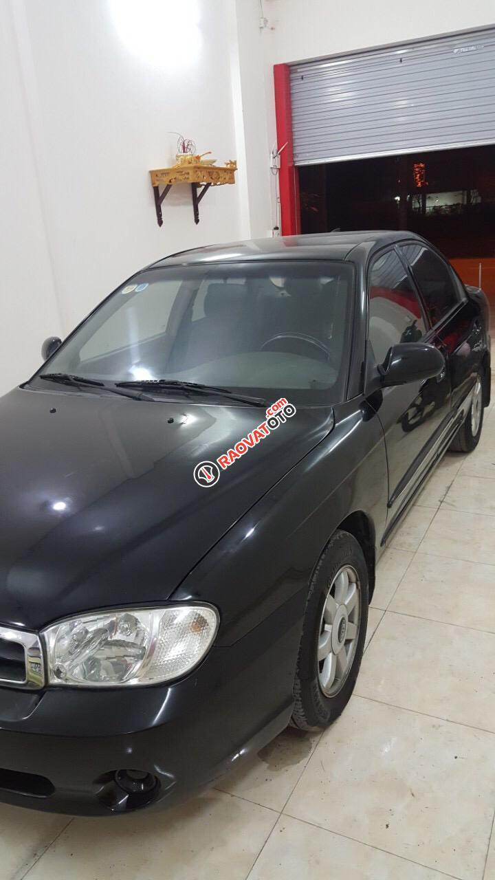 Bán xe Kia Spectra năm 2005 màu đen, giá tốt-0