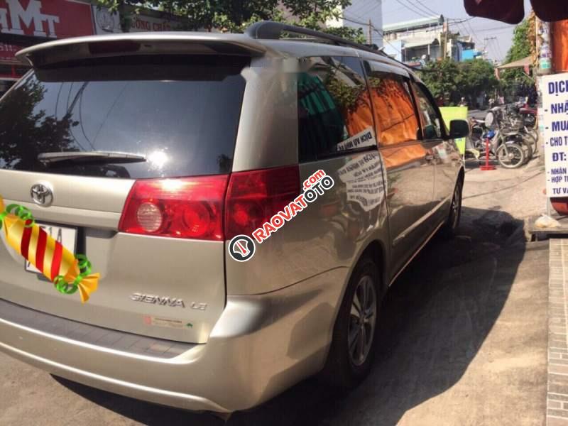 Bán Toyota Sienna LE sản xuất 2007, màu vàng, xe nhập, giá chỉ 575 triệu-0