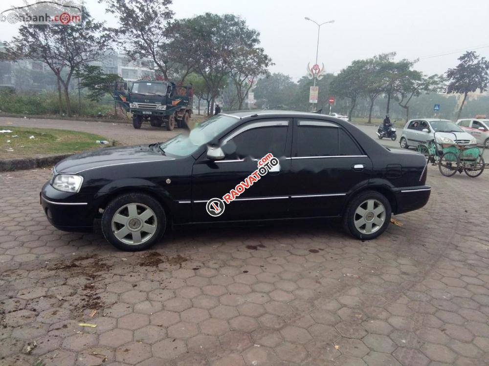 Bán Ford Laser Ghia 2004, màu đen như mới, giá tốt-4