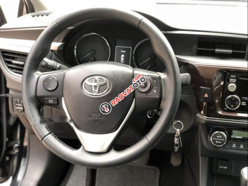Bán Toyota Corolla altis 1.8AT đời 2016, màu đen số tự động-0