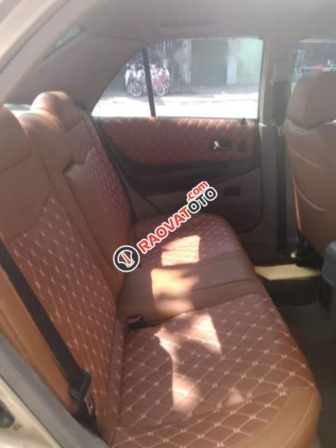 Bán xe Ford Laser 1.6MT 2002, màu vàng, nhập khẩu nguyên chiếc chính chủ-0