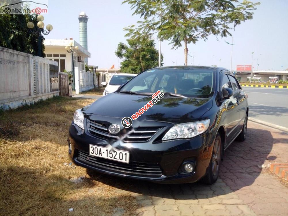 Bán ô tô Toyota Corolla altis 1.8G AT đời 2014, màu đen, 590tr-0