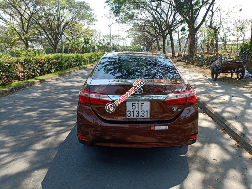 Bán xe Toyota Corolla Altis sản xuất 2015, màu nâu, xe nhà cần tiền bán gấp 645 triệu-7