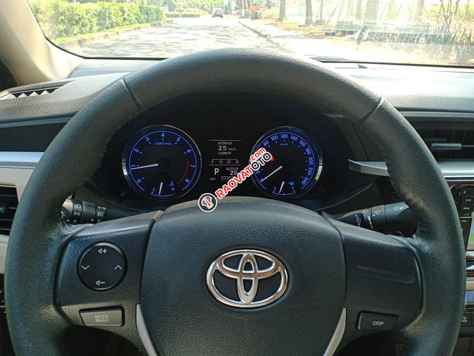 Bán xe Toyota Corolla Altis sản xuất 2015, màu nâu, xe nhà cần tiền bán gấp 645 triệu-1