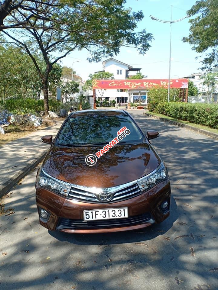 Bán xe Toyota Corolla Altis sản xuất 2015, màu nâu, xe nhà cần tiền bán gấp 645 triệu-9