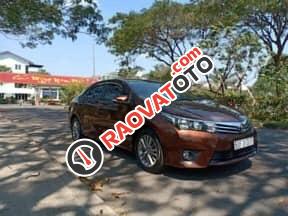 Bán xe Toyota Corolla Altis sản xuất 2015, màu nâu, xe nhà cần tiền bán gấp 645 triệu-1