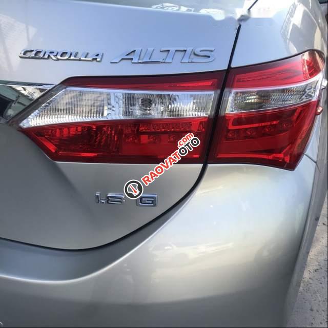 Bán xe Toyota Corolla altis 1.8G 2014, màu bạc số sàn, 560tr-3