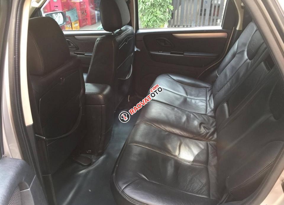 Gia đình cần bán Escape XLS 2010, số tự động, màu bạc-7