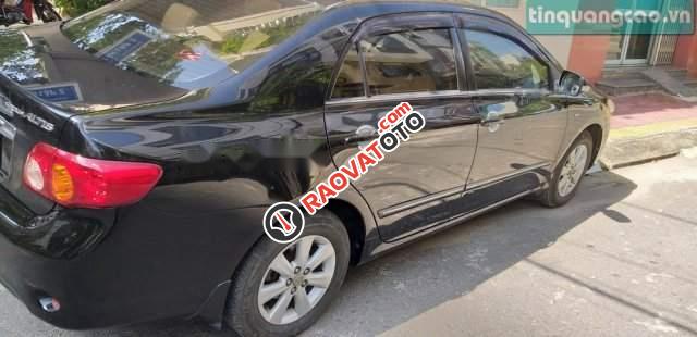 Cần bán Toyota Corolla altis 1.8 năm 2009, màu đen số tự động-0