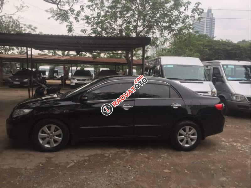 Bán Toyota Corolla altis 1.8MT 2009, màu đen chính chủ, giá tốt-0