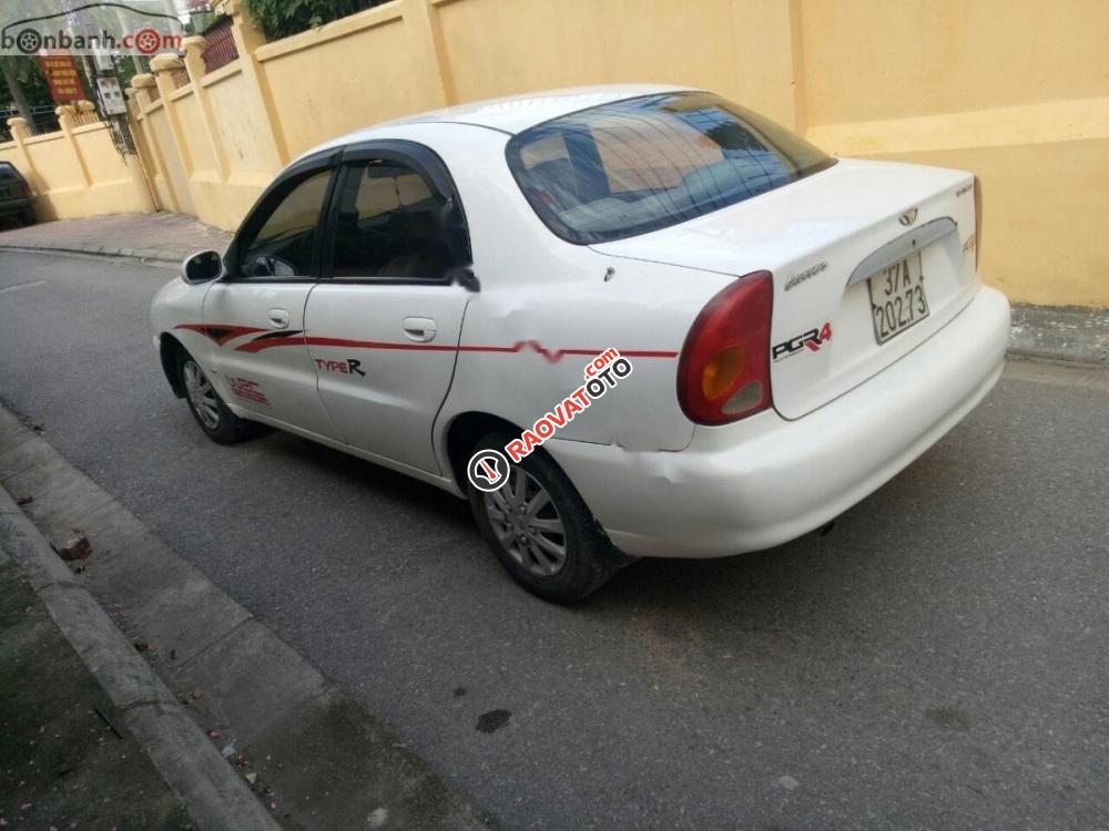 Gia đình cần bán Daewoo Lanos SX đời 2004, màu trắng, giá 72tr-4