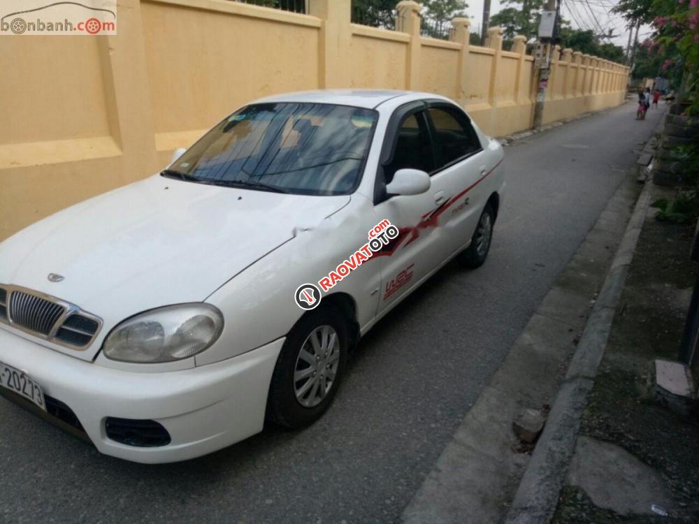 Gia đình cần bán Daewoo Lanos SX đời 2004, màu trắng, giá 72tr-3