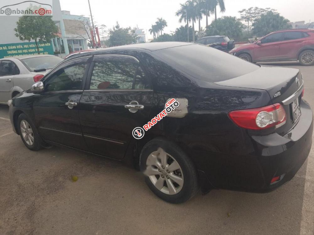 Bán xe Corolla Altis màu đen, số tự động, sx năm 2010 đăng ký 2011-2