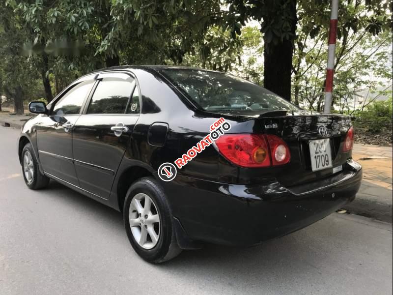 Cần bán Toyota Corolla altis 1.8G đời 2003, màu đen, giá 230tr-3