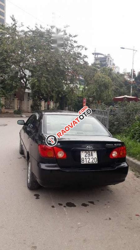 Gia đình bán xe Toyota Corolla Altis MT năm 2003, màu đen-1