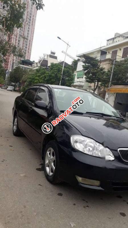 Gia đình bán xe Toyota Corolla Altis MT năm 2003, màu đen-2