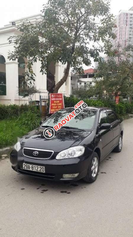 Gia đình bán xe Toyota Corolla Altis MT năm 2003, màu đen-0