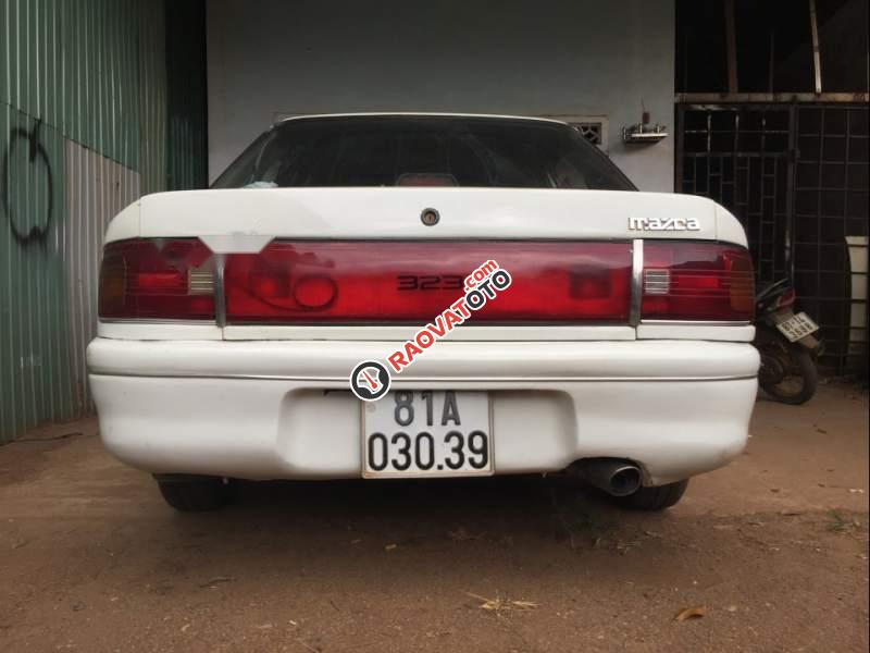Cần bán xe Mazda 323 năm sản xuất 1996, màu trắng, nhập khẩu, tình trạng xe bình thường-5