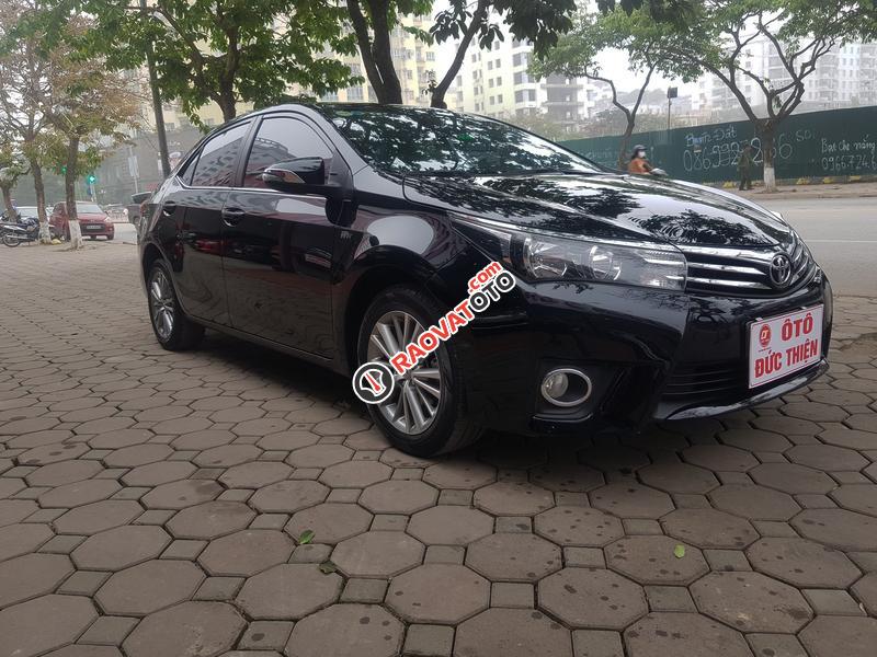 Bán Toyota Corolla Altis 1.8G AT sản xuất năm 2014, màu đen, 655 triệu-2