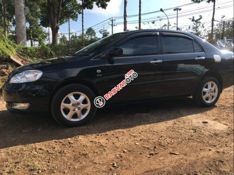 Bán Toyota Corolla altis 1.8 MT 2004, màu đen, giá 270tr-1