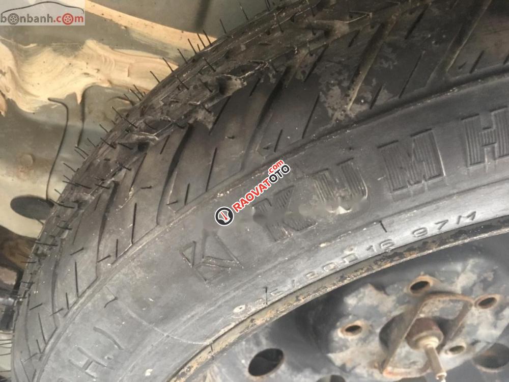 Cần bán gấp Kia Carens 2.0 sản xuất 2010, màu bạc xe gia đình-2