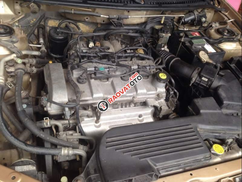 Bán xe Ford Laser 1.8 2003, màu vàng, chính chủ-1