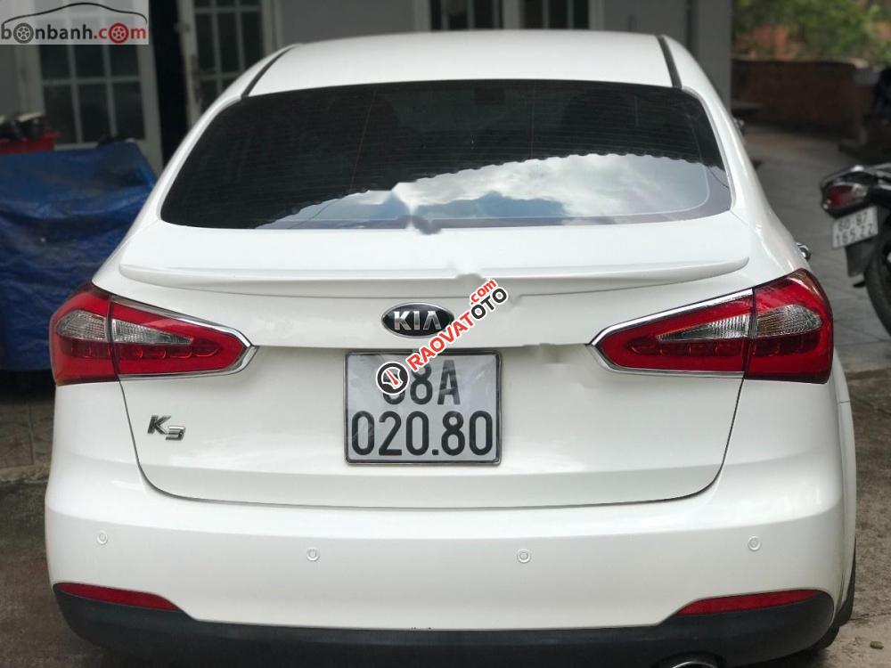 Cần bán lại xe Kia K3 MT đời 2015, màu trắng xe gia đình, giá 420tr-2