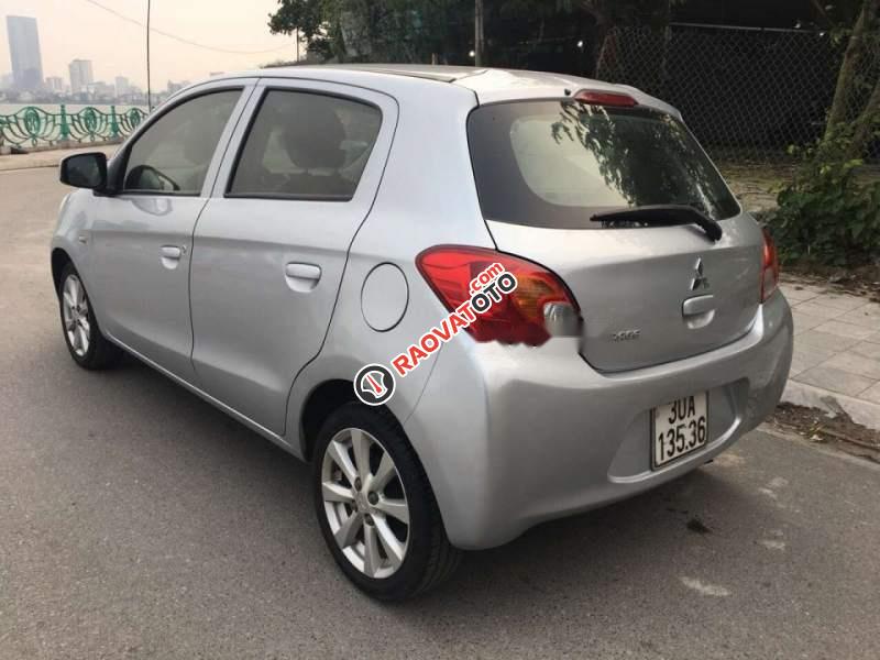 Cần bán gấp Mitsubishi Mirage MT sản xuất 2014, màu bạc, xe gia đình sử dụng tiết kiệm nhiên liệu-1