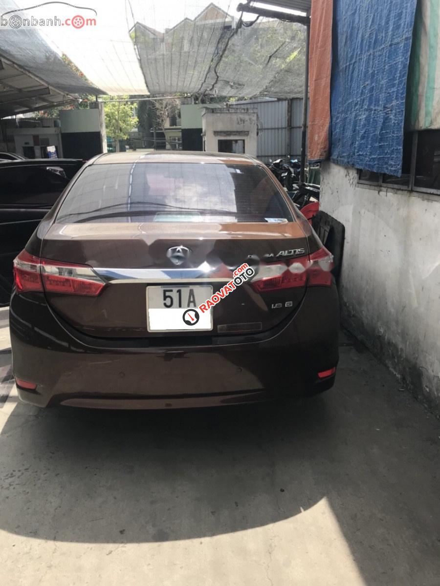 Bán xe cũ Toyota Corolla altis 1.8G AT sản xuất 2014, màu nâu-0