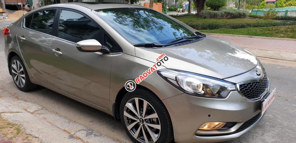 Bán Kia K3 1.6 AT số tự động model 2014, Sx 2013, màu vàng 1 đời chủ mới 90%-2