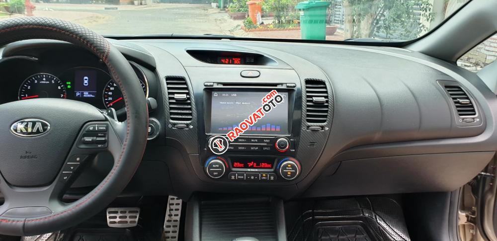 Bán Kia K3 1.6 AT số tự động model 2014, Sx 2013, màu vàng 1 đời chủ mới 90%-9