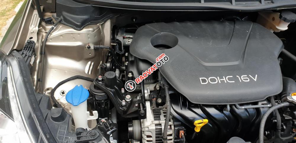 Bán Kia K3 1.6 AT số tự động model 2014, Sx 2013, màu vàng 1 đời chủ mới 90%-23