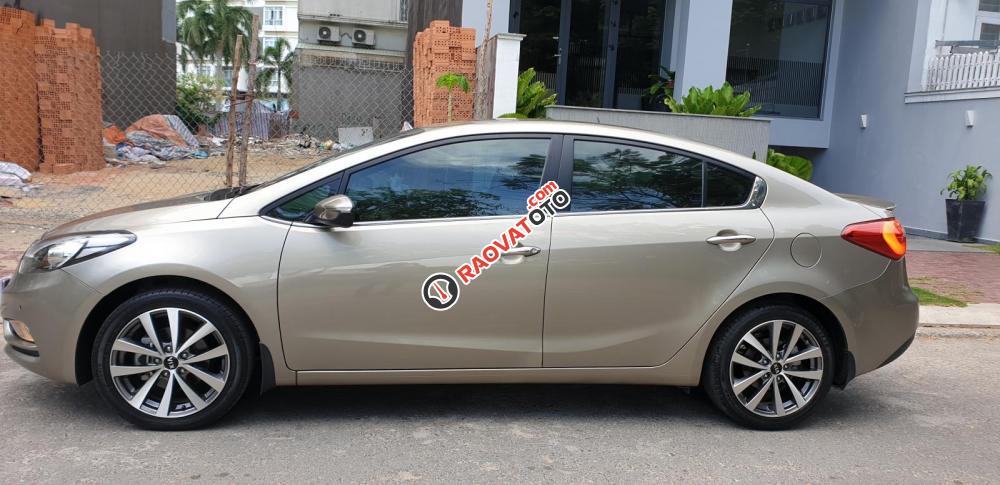 Bán Kia K3 1.6 AT số tự động model 2014, Sx 2013, màu vàng 1 đời chủ mới 90%-8