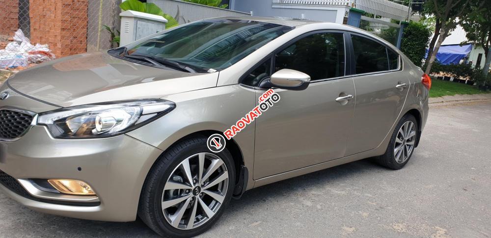 Bán Kia K3 1.6 AT số tự động model 2014, Sx 2013, màu vàng 1 đời chủ mới 90%-1