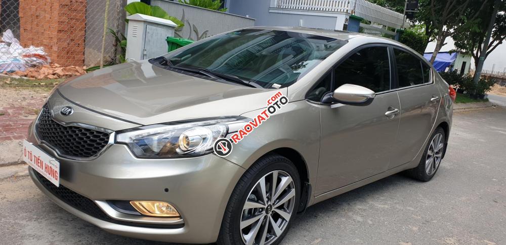 Bán Kia K3 1.6 AT số tự động model 2014, Sx 2013, màu vàng 1 đời chủ mới 90%-0