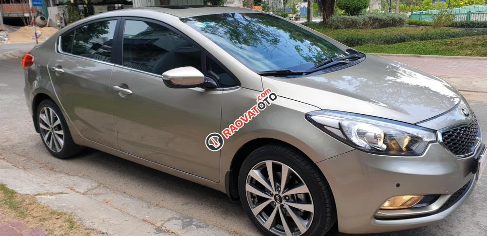 Bán Kia K3 1.6 AT số tự động model 2014, Sx 2013, màu vàng 1 đời chủ mới 90%-3