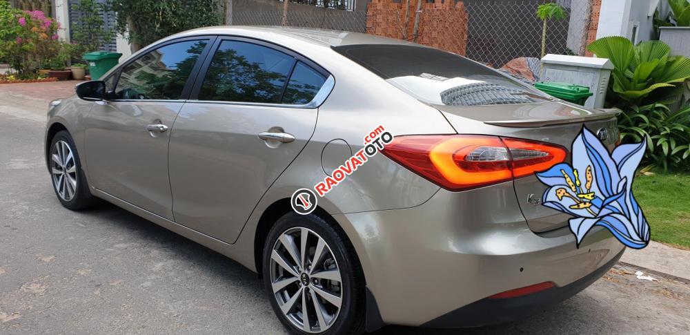 Bán Kia K3 1.6 AT số tự động model 2014, Sx 2013, màu vàng 1 đời chủ mới 90%-5