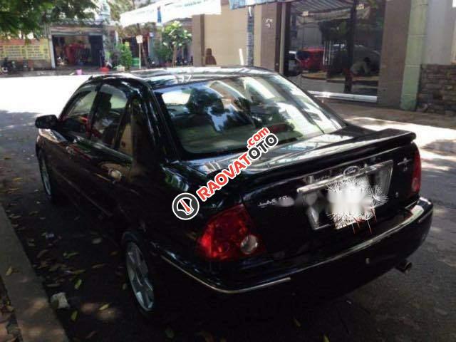 Bán xe Ford Laser Ghi 1.8 2011, màu đen, xe gia đình 
-0