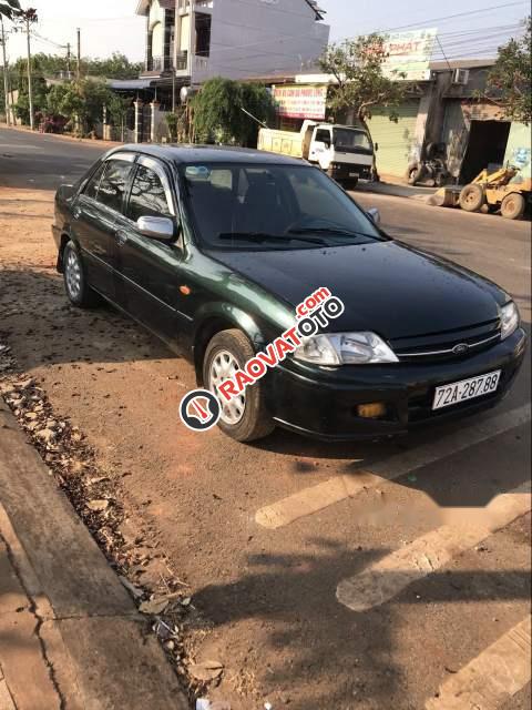 Cần bán gấp Ford Laser 2001, màu đen, xe gia đình, 125tr-0