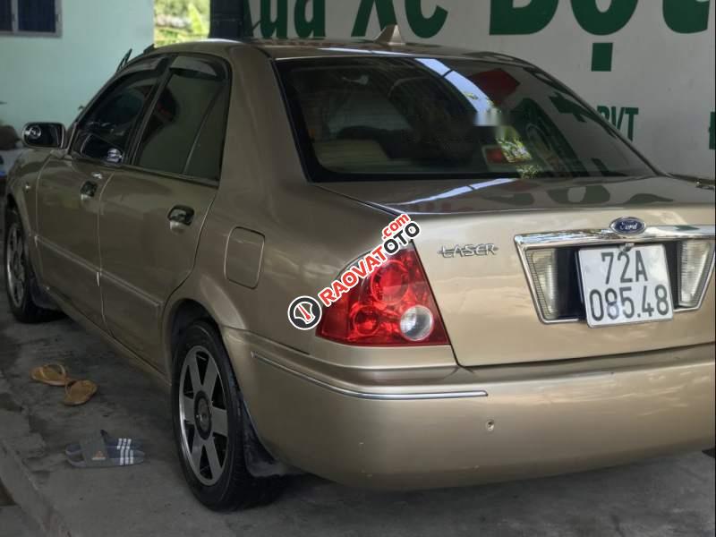 Bán xe Ford Laser sản xuất năm 2003, màu vàng, giá tốt-2